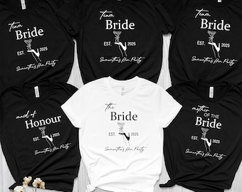 May include: A collection of black and white t-shirts with various bridal party titles. The shirts feature the text "Team Bride," "The Bride," "Maid of Honour," and "Mother of the Bride," along with the text "EST. 2025" and "Samantha's Hen Party."