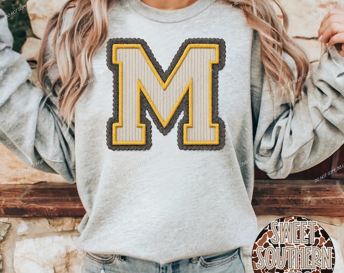 Gold Seersucker Letter M with Lace: Transparent PNG Graphic