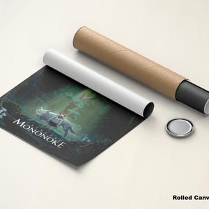 May include: A rolled canvas poster featuring a fantasy illustration with the text "Princess Mononoke." The artwork depicts a figure riding a wolf in a forest setting. The poster is accompanied by a brown cardboard tube and a white rolled paper.