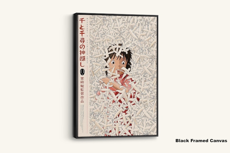 May include: Black framed canvas art featuring a scene from the animated film "Spirited Away." The artwork depicts a young girl surrounded by white paper-like figures. Japanese text is visible on the left side of the canvas.