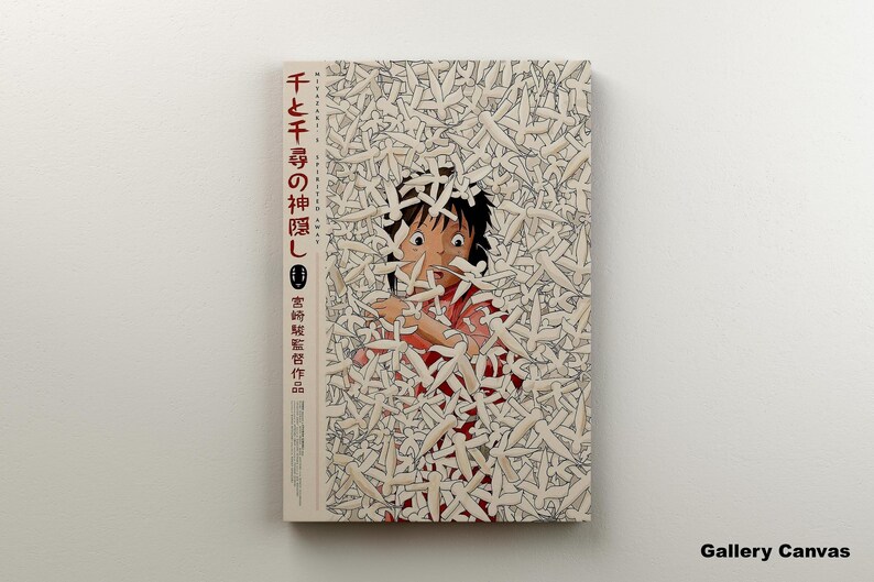 May include: Canvas art print featuring a scene from the animated film "Spirited Away." The artwork depicts a character surrounded by white figures, with Japanese text on the left side. The canvas is mounted on a white wall.