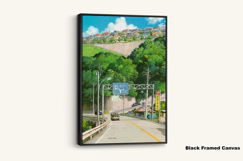 May include: A framed canvas print featuring an anime-style illustration of a road leading through a lush green landscape. The artwork depicts a road with a sign, trees, and buildings on a hillside under a blue sky with clouds. The canvas is framed in black.