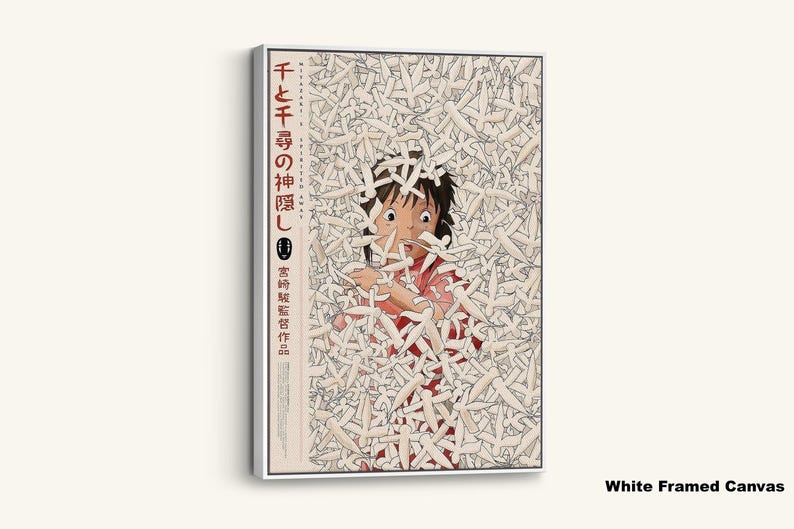 May include: White framed canvas art featuring a scene from the animated film "Spirited Away." The artwork depicts a young girl surrounded by white paper-like figures. Japanese text is visible on the left side of the canvas.