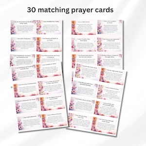 May include: A collection of 30 matching prayer cards featuring floral borders in shades of pink, purple, and orange. Each rectangular card contains a unique religious affirmation and prayer text printed in black ink on a white background.