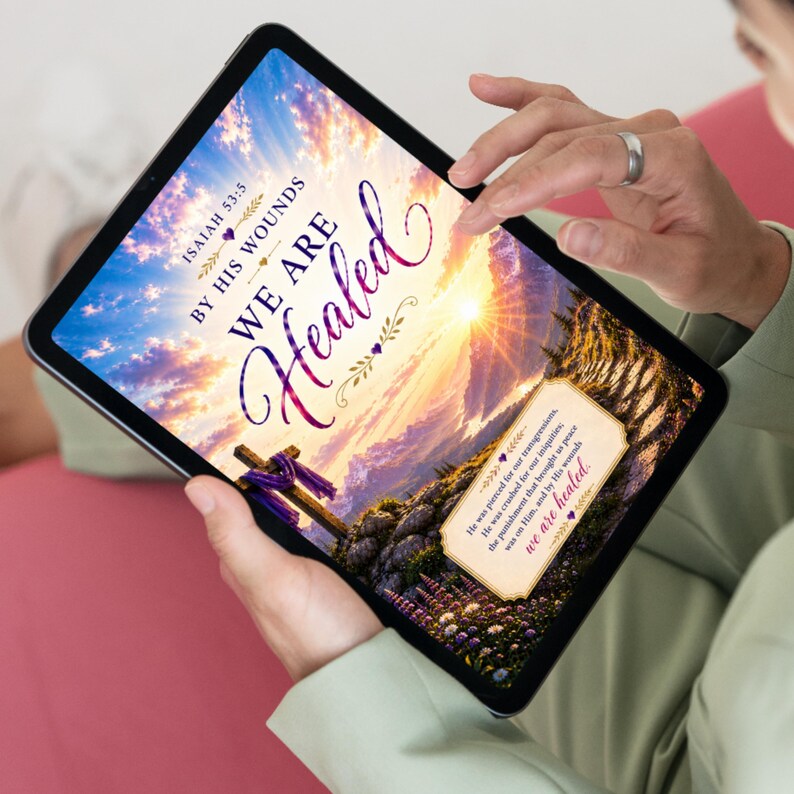 May include: A digital tablet displaying a religious graphic with a sunset sky, a wooden cross draped in purple fabric, and the text Isaiah 53:5 By His Wounds We Are Healed, along with a box containing the full scripture verse in dark text.