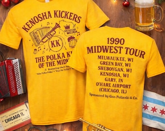 May include: A bright yellow short-sleeve t-shirt featuring dark brown text and graphics. The front displays Kenosha Kickers, an accordion, and a beer mug. The back lists 1990 Midwest Tour dates including Milwaukee, Green Bay, Sheboygan, Kenosha, Gary, and O'Hare Airport.