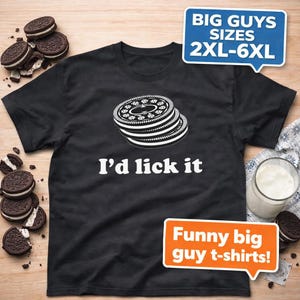 May include: Black t-shirt with a white graphic of stacked cookies and the text "I'd lick it." The shirt also has text that says "BIG GUYS SIZES 2XL-6XL" and "Funny big guy t-shirts!" Cookies and a glass of milk are in the background.