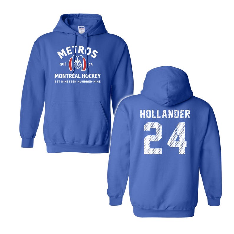 May include: A royal blue hooded sweatshirt featuring a front graphic with the text METROS, QU&Eacute;, CA, MONTR&Eacute;AL HOCKEY, EST NINETEEN HUNDRED-NINE and a logo. The back displays the name HOLLANDER and the number 24 in a white, textured, dotted font.