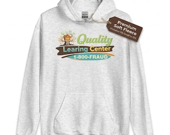 May include: A light gray hoodie with a front pocket and a hood. The front of the hoodie features a graphic with the words "Quality Learing Center" and the phone number "1-800-FRAUD". A tag reads "Premium Soft Fleece".