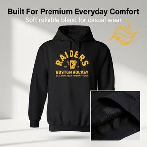 May include: A black hooded sweatshirt featuring yellow text that reads Raiders Boston Hockey Est. Nineteen Twenty-Four with a central shield logo. The hoodie includes a front kangaroo pocket and a soft, dark interior lining shown in an inset.