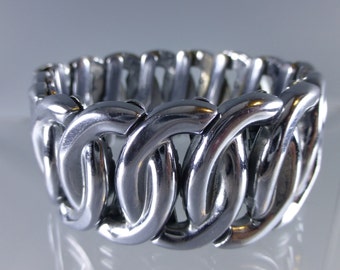 Pulsera elástica plateada con círculo ancho vintage de los años 50