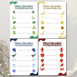 May include: Four colorful activity sheets for children. Each sheet features the text "TRACE THE LINES to connect the [color] items." The sheets include illustrations of various objects like clovers, dinosaurs, frogs, bananas, smiley faces, sunflowers, blueberries, whales, umbrellas, apples, strawberries, birds, and crabs.