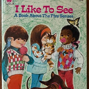Children’s Book Set by Walt Disney Productions “Tell-A-Tale” Children’s Books - Set of 4