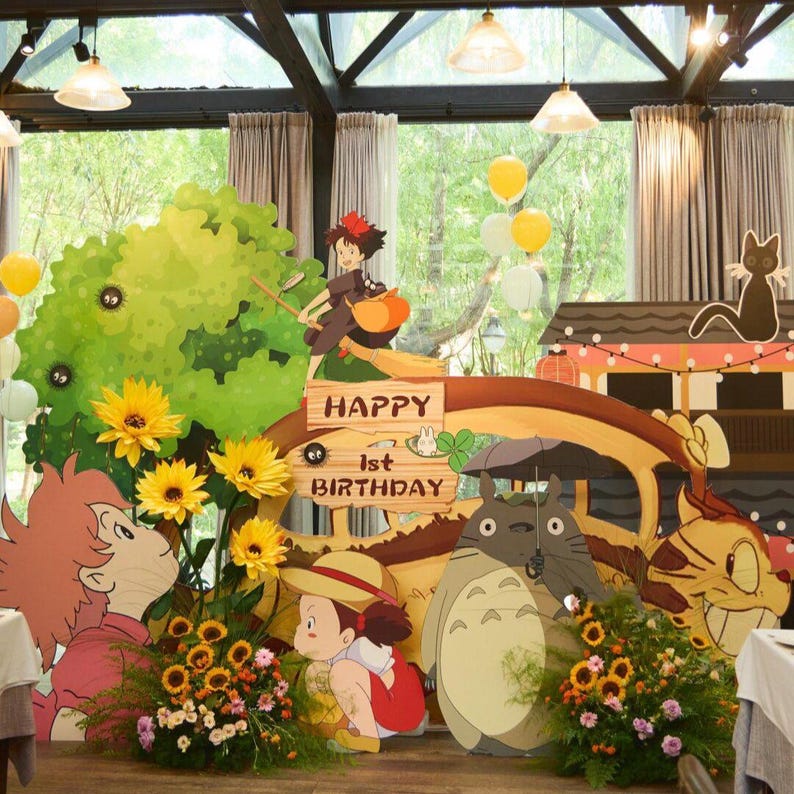 May include: A colorful birthday party scene featuring cartoon characters, sunflowers, and balloons. The words "Happy 1st Birthday" are displayed on a wooden sign. The scene includes a large tree and a house.