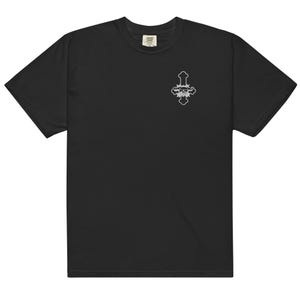 May include: Black t-shirt with a small, white, stylized cross design on the upper left chest. The shirt has a classic crew neck and short sleeves. The fabric appears soft and comfortable.