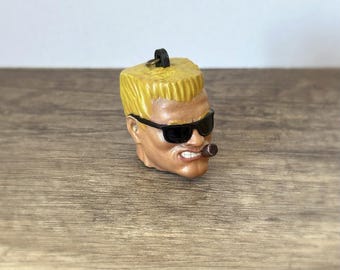 Decoratief miniatuurfiguurtje van Duke Nukem