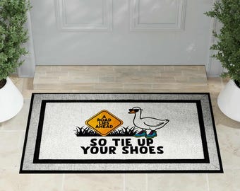 Welcome Mat | Tumble | A Road Lies Ahead So Tie Up Your Shoes