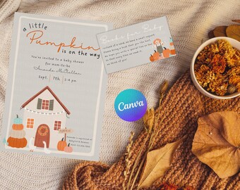 May include: Baby shower invitation with a pumpkin theme. The invitation reads "a little Pumpkin is on the way" with a house illustration. A smaller card says "Books for Baby". The scene includes a bowl of dried flowers and a cozy blanket.