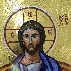 May include: A mosaic portrait of a man with brown hair and a beard, wearing a purple and blue robe. The background is gold, with a red and white halo around the man's head. The mosaic is made of small, square tiles.