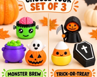 May include: A set of six Halloween-themed figurines featuring a green monster with a brain, a purple cauldron with green bubbles, a ghost in a pumpkin, a grim reaper with a scythe, a candy corn, and a black coffin. Text reads CHOOSE YOUR SET OF 3.