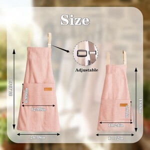 May include: Two pink and white striped aprons with adjustable straps. The larger apron is 35.43 inches long and 26.38 inches wide. The smaller apron is 19.69 inches long and 17.72 inches wide. Both aprons have a pocket and a leather patch.