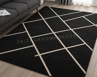 May include: Black area rug with a geometric grid pattern in off-white. The rug is rectangular and placed on a light wood floor. The text "FAIZA HANDMADERUGS" is printed on the rug.