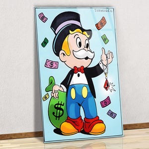 May include: A framed artwork featuring a cartoon character in a top hat and tuxedo, holding a gem and a money bag. The character is surrounded by floating dollar bills. The artwork has the text "Tiffany & Co."