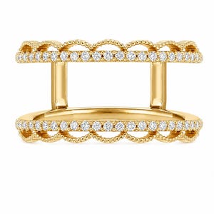 May include: A gold-colored ring with a double band design. The ring is adorned with small, sparkling diamonds set along the top and bottom bands, and features a decorative scalloped edge.