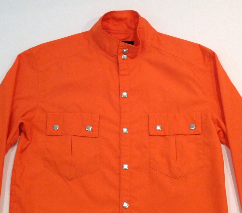Obermeyer Western Shirt Jacket 1980s Vintage Decorative Metal Pearl Snap Ski Shirt with banded collar Orange Lightweight Overshirt VTG