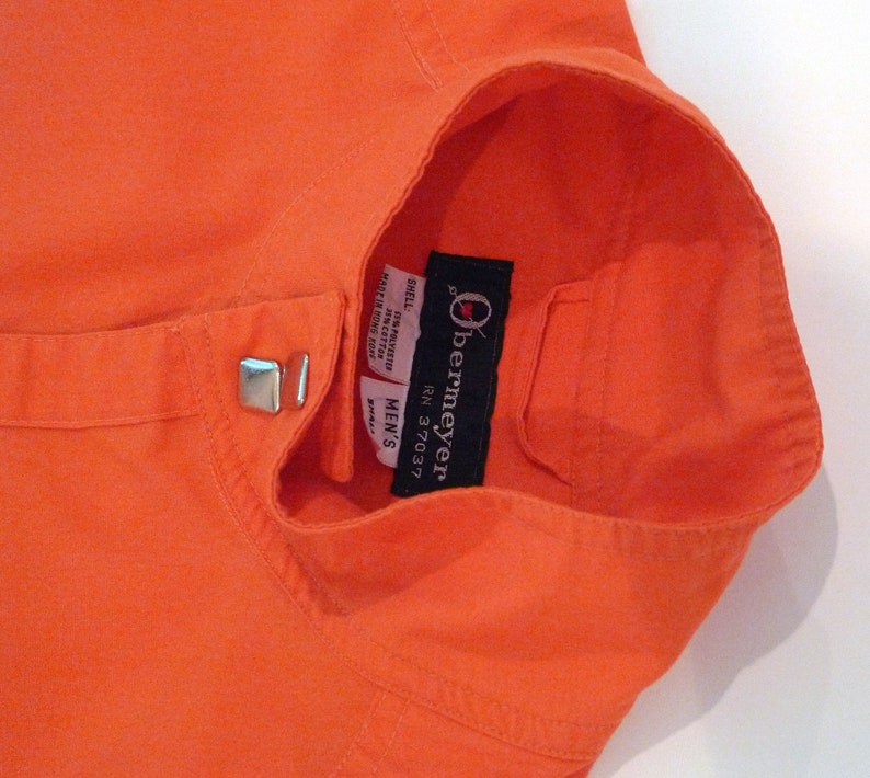 Obermeyer Western Shirt Jacket 1980s Vintage Decorative Metal Pearl Snap Ski Shirt with banded collar Orange Lightweight Overshirt VTG