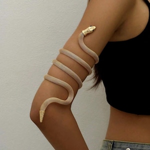 Pulseira egípcia ajustável com braço de cobra dourada