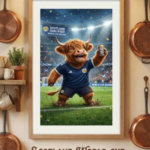 May include: Digital art print in a wooden frame featuring a cartoon Highland cow in a Scotland soccer uniform. The cow is holding a can of Irn-Bru. Text reads "Scotland World Cup Qualifier - Get Your Digital Print Now!"
