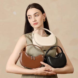 Mooncrest Vintage Leder Geldbörse - halbmondförmige Crossbody-Umhängetasche für Damen