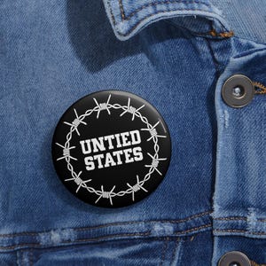 Vereinigte Staaten – Anstecknadel für politischen Protest mit Stacheldraht-Design