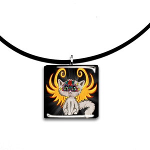 May include: A square pendant necklace featuring a cartoon cat with colorful sugar skull makeup, angel wings, and a fluffy tail. The pendant hangs from a black cord. The background is black with a white letter "E".