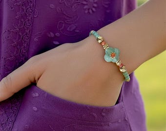 Handmade bracelets made with Miyuki beads and semi-precious stones. Bracelets made with genuine natural aventurine and apatite stones.