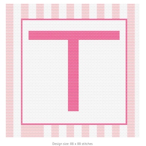 May include: A pink cross-stitch design featuring the letter "T" within a pink rectangular border. The background has a white and pink striped pattern. The design size is 88 x 88 stitches.