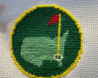 Diseño de bordado con el logotipo de Masters