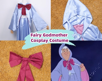 May include: A light blue Fairy Godmother cosplay costume with a burgundy bow. The costume includes a hooded cape and a dress. The image also features a burgundy bow and a cartoon image of the Fairy Godmother.