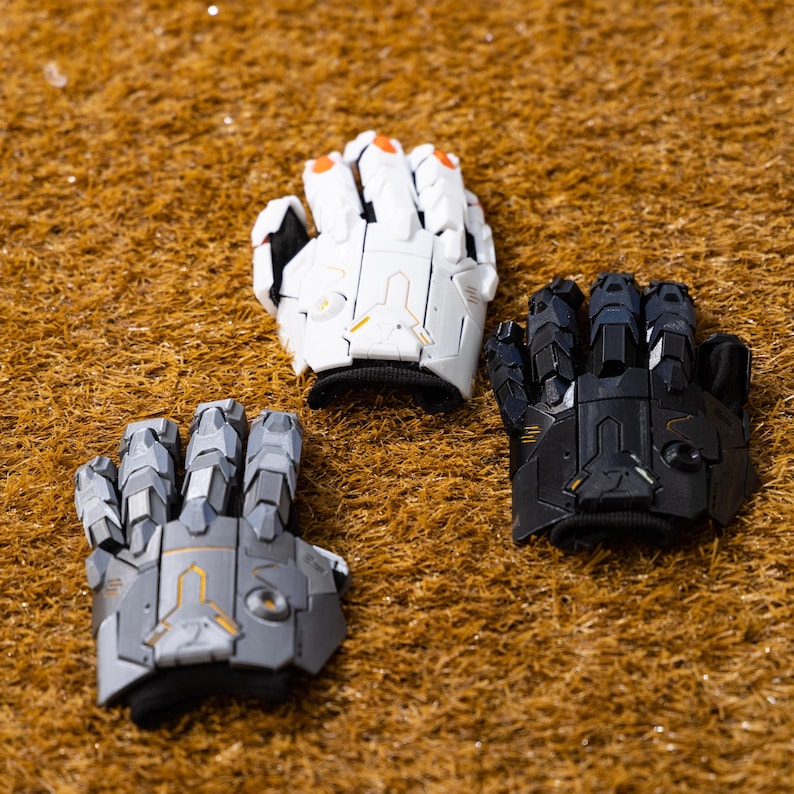 Cyberpunk Mecha Gloves presented on a model’s hand, showcasing the sleek silhouette and advanced dystopian style ideal for cyberpunk cosplay, futuristic costumes, and sci-fi themed photography sessions. The 3D printed armor exoskeleton shines under directional lighting, bringing out the sculpted panels, vent-like details, and reinforced knuckle guards that replicate the look of high-tech robotics.