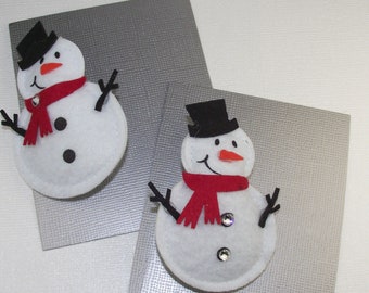 snowman pin...stuffed snowman with swarovski crystals. holiday fun.