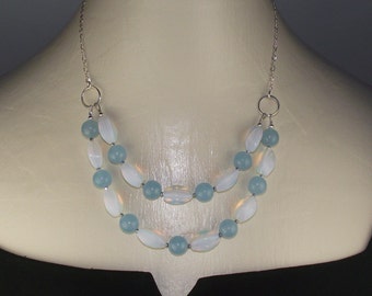 Quartz and moonstone.  cool blue quartz paired with glowing moonstone necklace and earrings