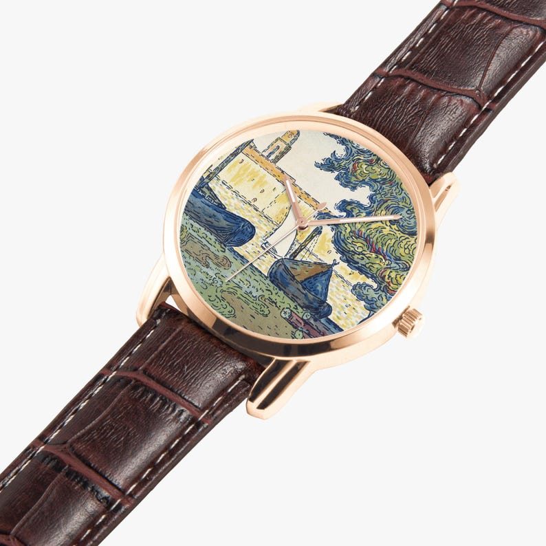 May include: A gold-toned wristwatch with a brown leather band. The watch face features a colorful painting of boats and buildings. The band is textured with white stitching. The watch is angled, showing the face and part of the band.