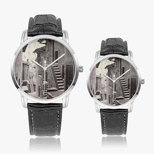 May include: Two silver-toned wristwatches with black leather bands. The watch faces display a black and white architectural scene with stairs and buildings. The watches are displayed on a white background.