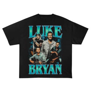 Puede incluir: Camiseta negra con un gráfico de estilo vintage de Luke Bryan y el texto "LUKE BRYAN" en color turquesa. El gráfico incluye múltiples imágenes de Luke Bryan. La camiseta está hecha de un material suave y cómodo.