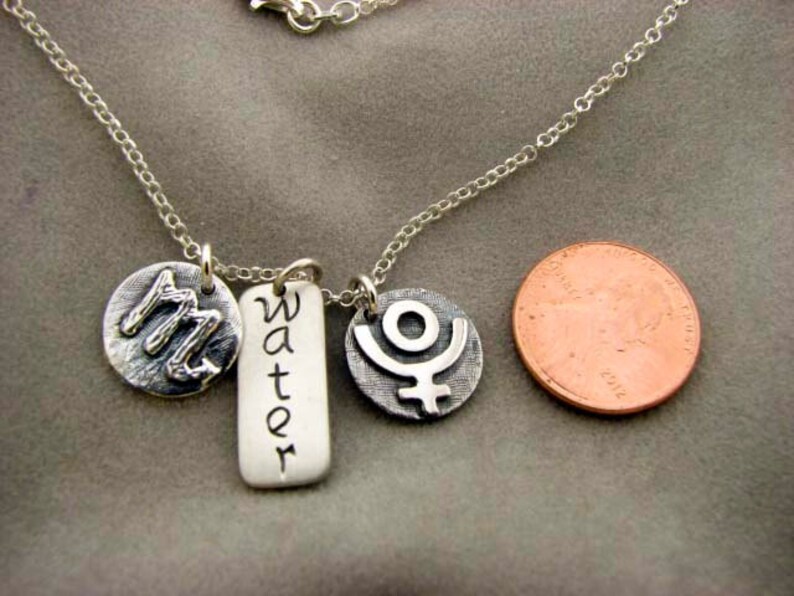 SCORPIO Sign With Element WATER and Ruling PLUTO. Silver