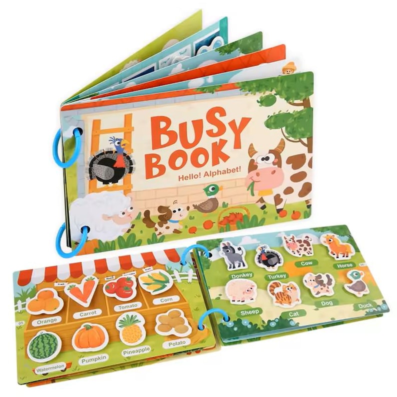 May include: A colorful children's "Busy Book" with the text "Hello! Alphabet!" features farm animals and fruits and vegetables. The book has blue ring binding and includes removable animal and food pieces for interactive play.