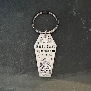 Hand stamped Knit fast, Die Warm skeleton, keychain image 1