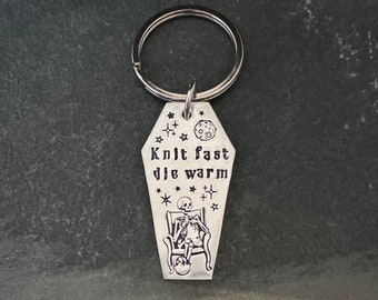 Hand stamped “Knit fast, Die Warm” skeleton, keychain