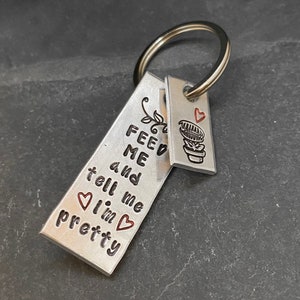 Venus fly trap “feed me…”  hand stamped keychain